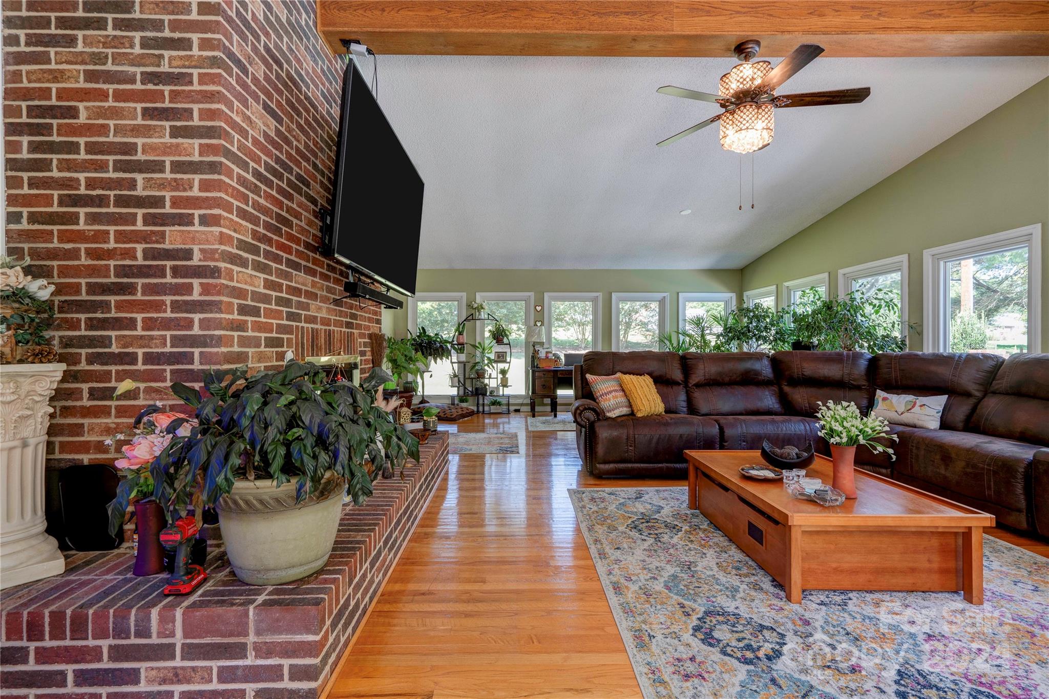 2352 Sheriff Allen Road Shelby, NC 28152 - Photo 20 of 48 a living room with furniture and a potted plant