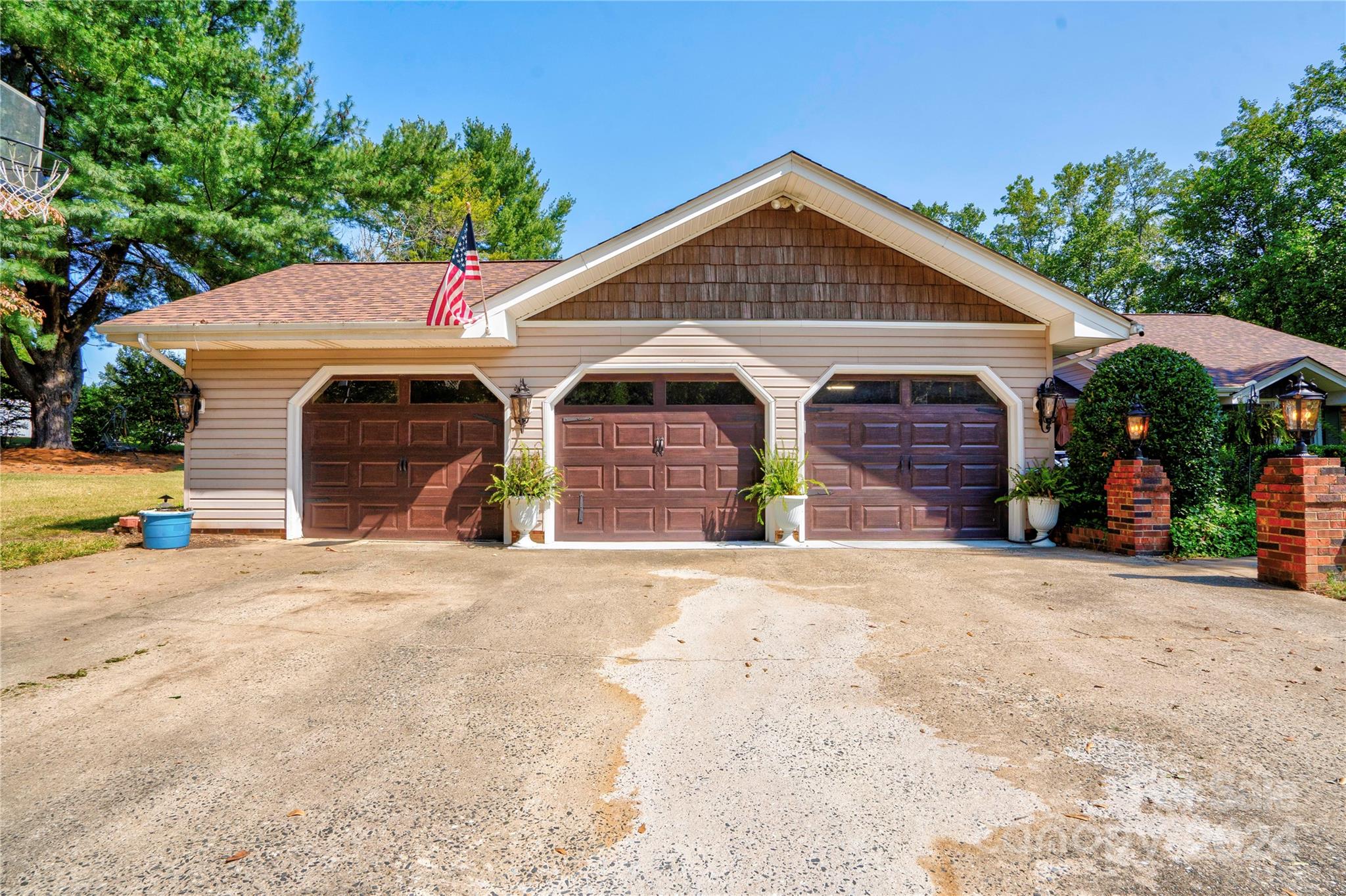 2352 Sheriff Allen Road Shelby, NC 28152 - Photo 2 of 48 a front view of a house with a yard and garage