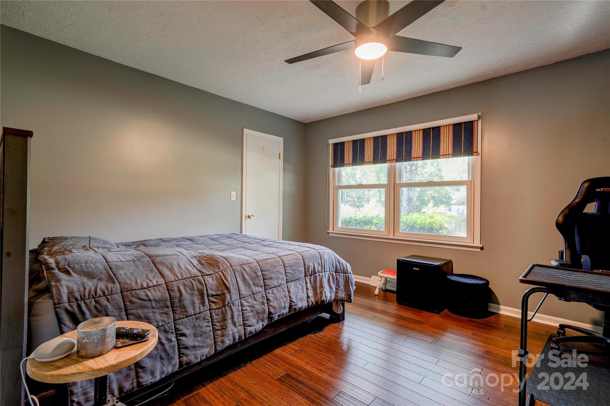 2352 Sheriff Allen Road Shelby, NC 28152 - Photo 29 of 48 a bedroom with a bed and wooden floor