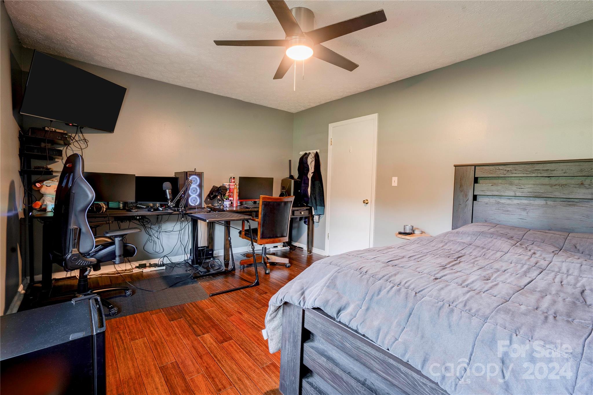 2352 Sheriff Allen Road Shelby, NC 28152 - Photo 30 of 48 a bedroom with a bed and a flat screen tv