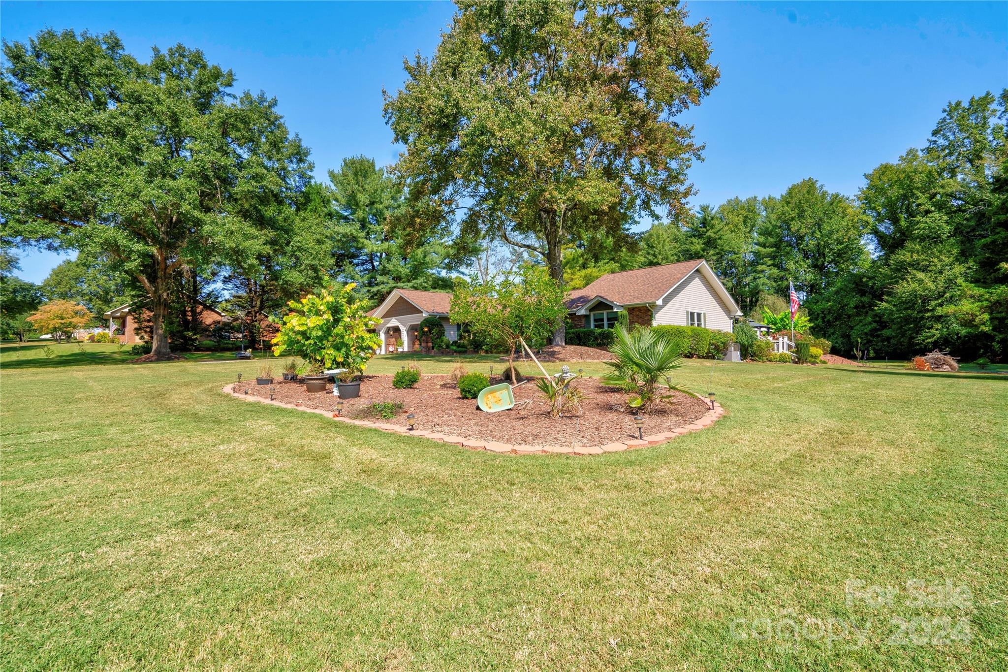 2352 Sheriff Allen Road Shelby, NC 28152 - Photo 40 of 48 a view of a backyard with a garden