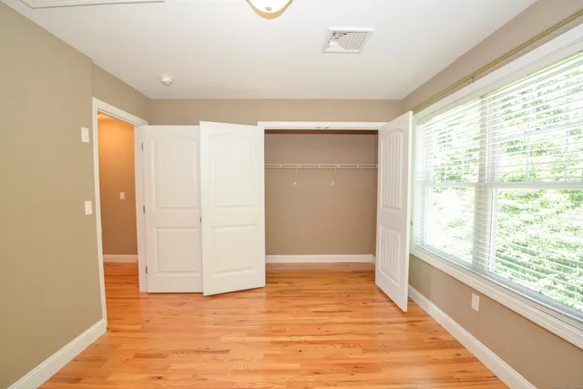 a view of an empty room and window