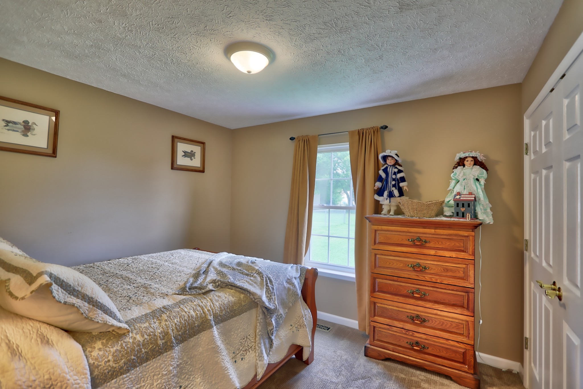 7696 South Swift Road Goodlettsville, TN 37072 - Photo 20 of 31 a bedroom with a bed and a window