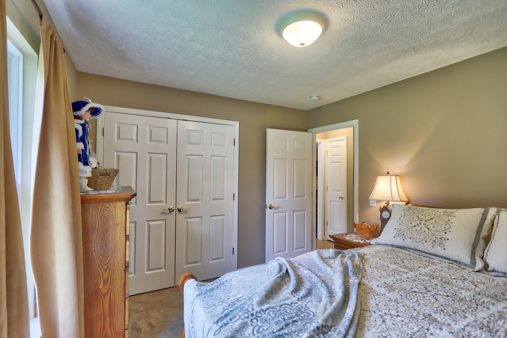 7696 South Swift Road Goodlettsville, TN 37072 - Photo 21 of 31 a bedroom with a bed and a dresser
