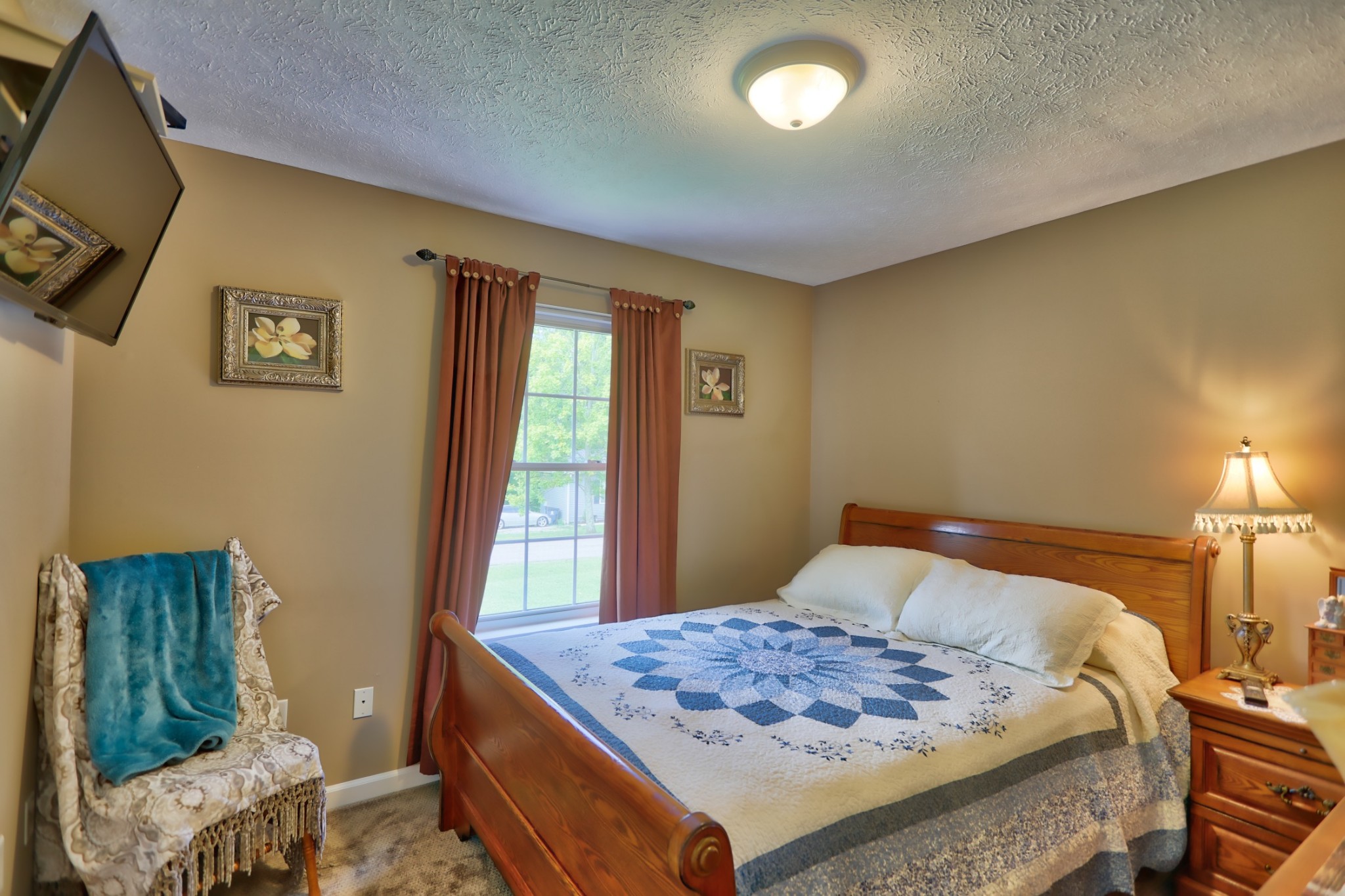 7696 South Swift Road Goodlettsville, TN 37072 - Photo 22 of 31 a bedroom with a bed and a window