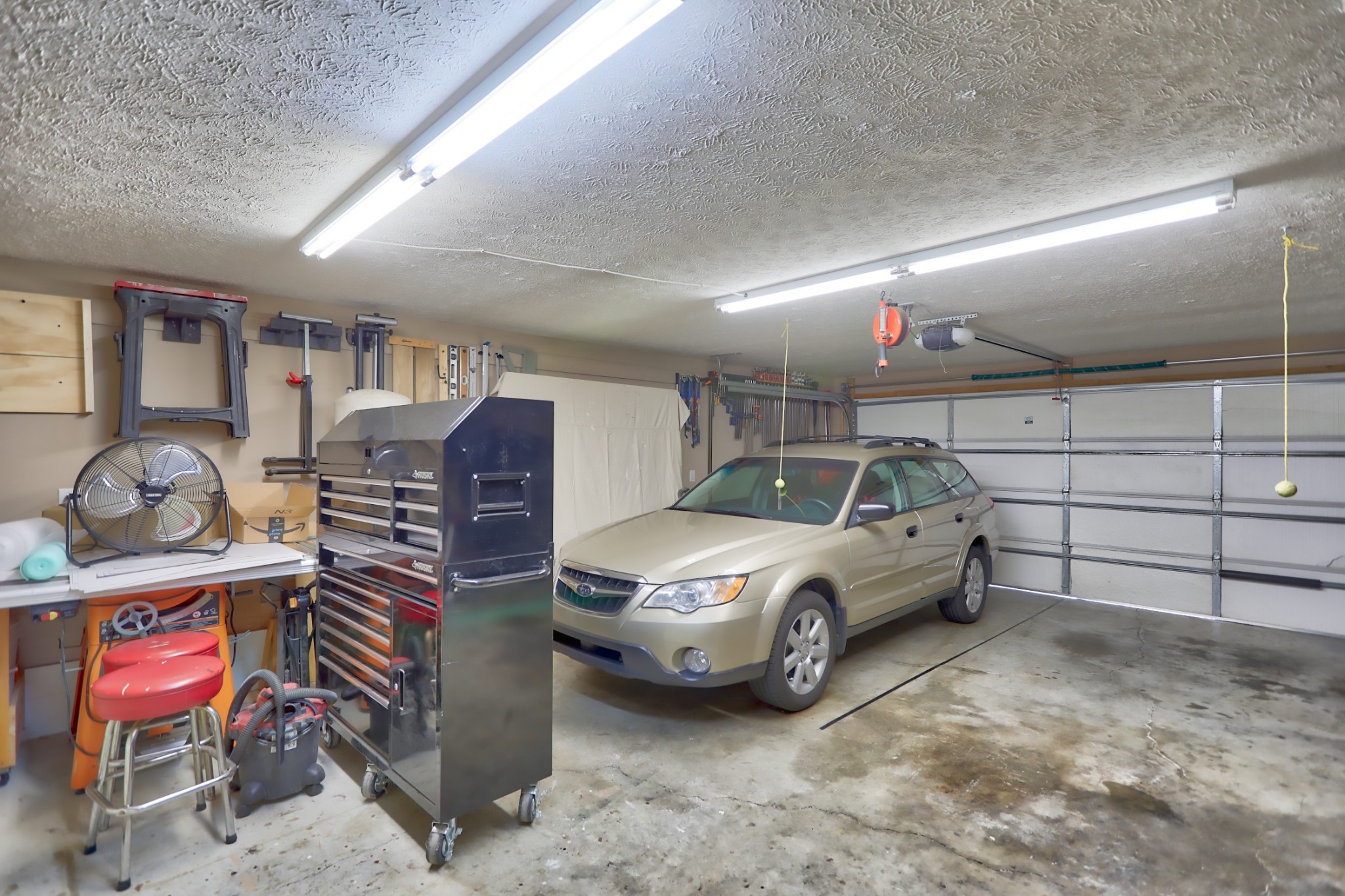 7696 South Swift Road Goodlettsville, TN 37072 - Photo 27 of 31 a car parked in a garage