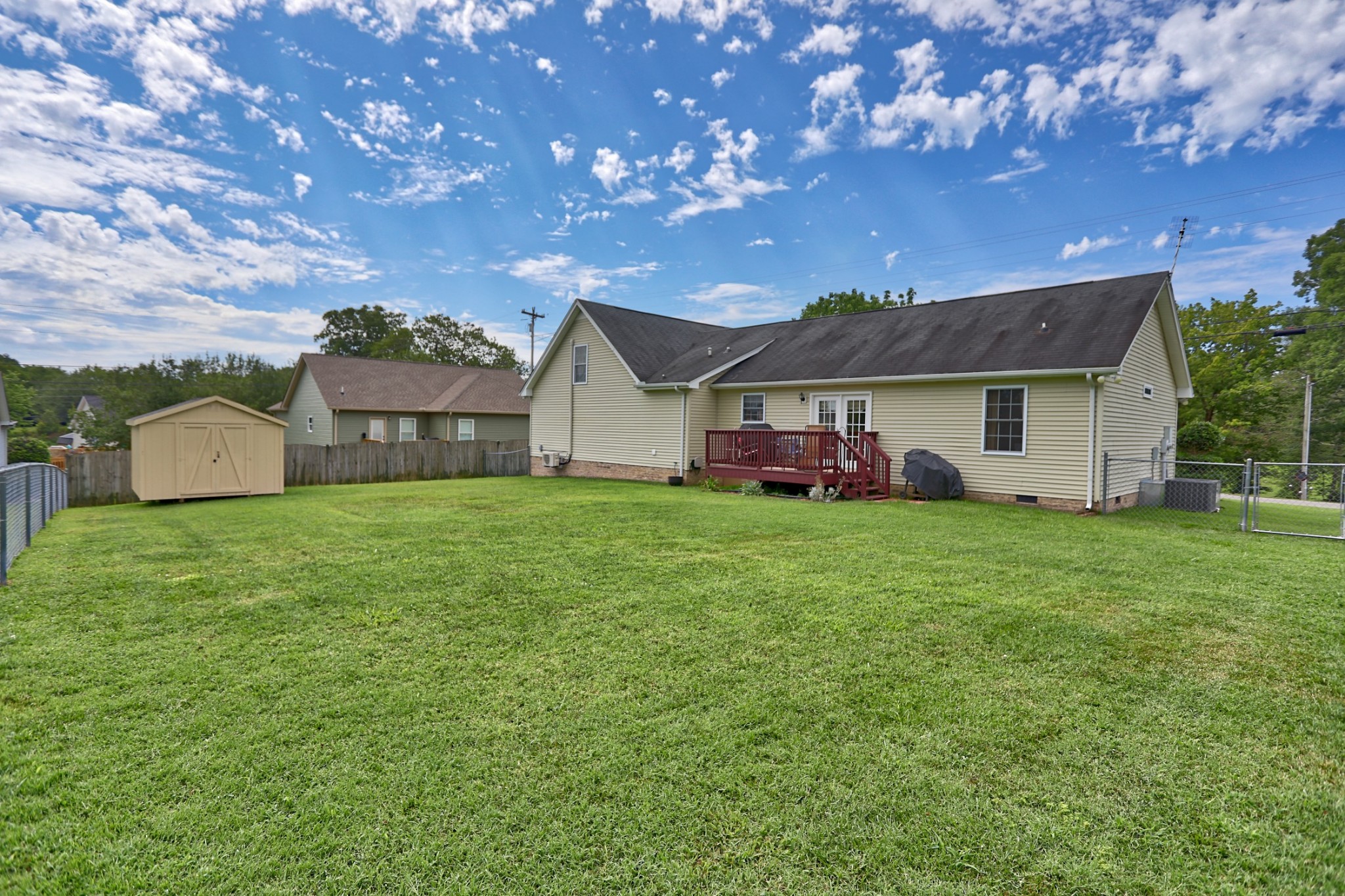 7696 South Swift Road Goodlettsville, TN 37072 - Photo 28 of 31 a front view of house with yard and trees in the background