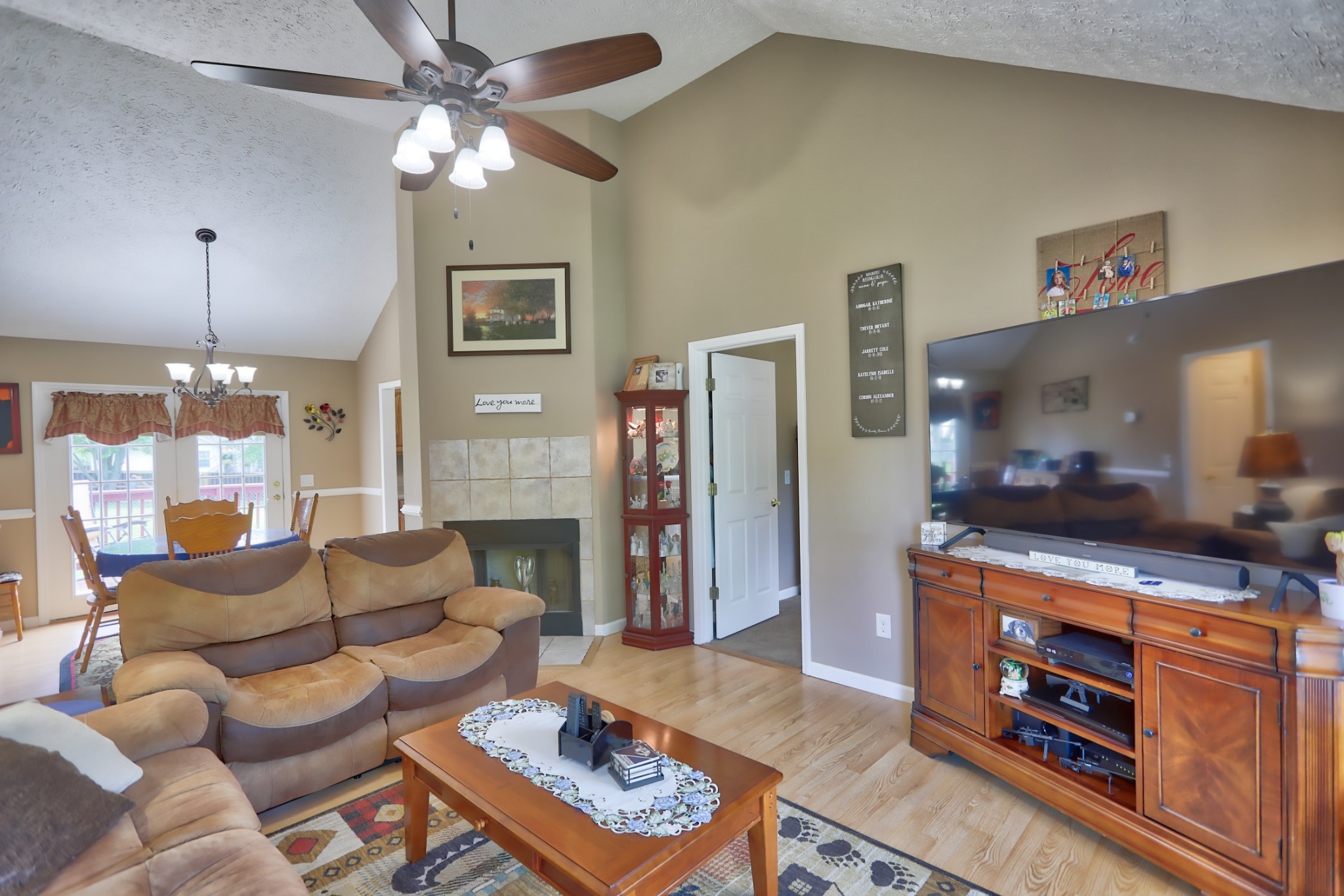 7696 South Swift Road Goodlettsville, TN 37072 - Photo 3 of 31 a living room with furniture and a flat screen tv