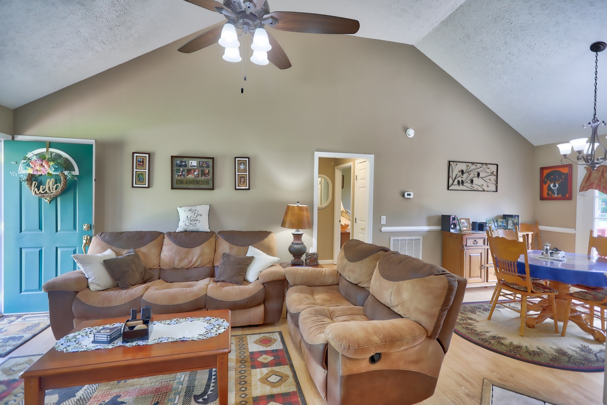 7696 South Swift Road Goodlettsville, TN 37072 - Photo 7 of 31 a living room with furniture and a chandelier