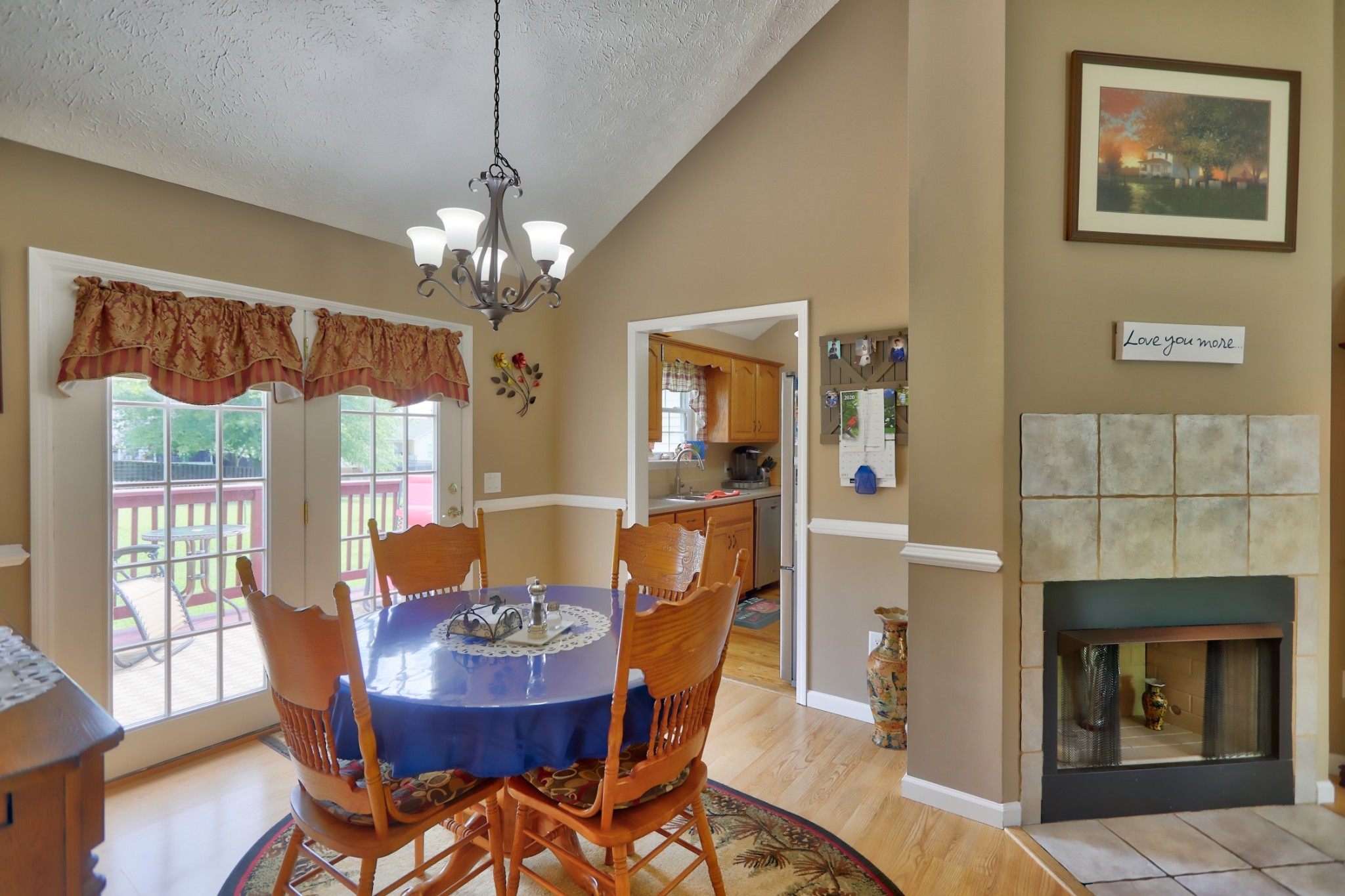7696 South Swift Road Goodlettsville, TN 37072 - Photo 8 of 31 a dining room with furniture a chandelier and window
