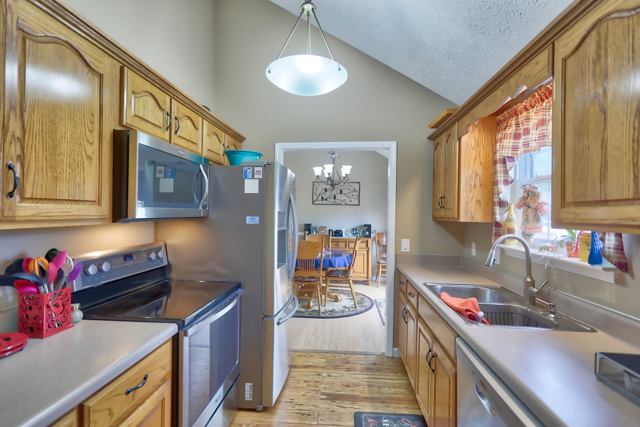 7696 South Swift Road Goodlettsville, TN 37072 - Photo 10 of 31 a kitchen that has a lot of cabinets and wooden floor