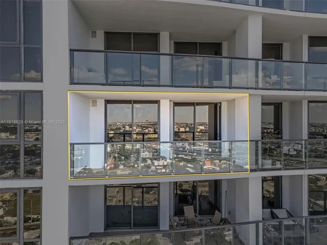 a kitchen with a table and chairs