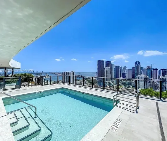 a view of a swimming pool and a terrace