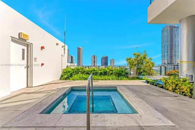 a view of a patio with potted plants