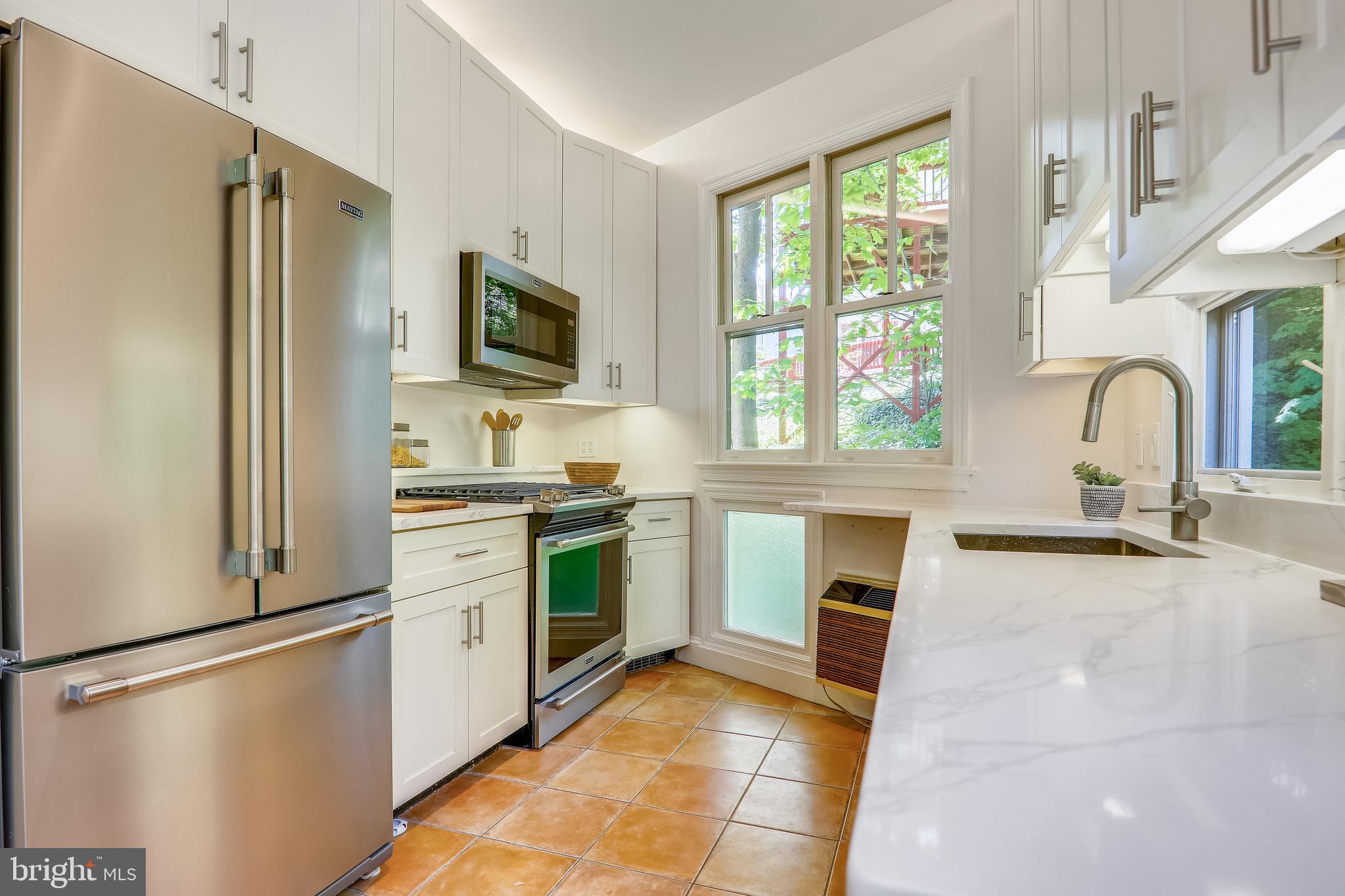 3512 30th Street Northwest Washington, DC 20008 - Photo 17 of 50 Renovated kitchen with quartz counter tops