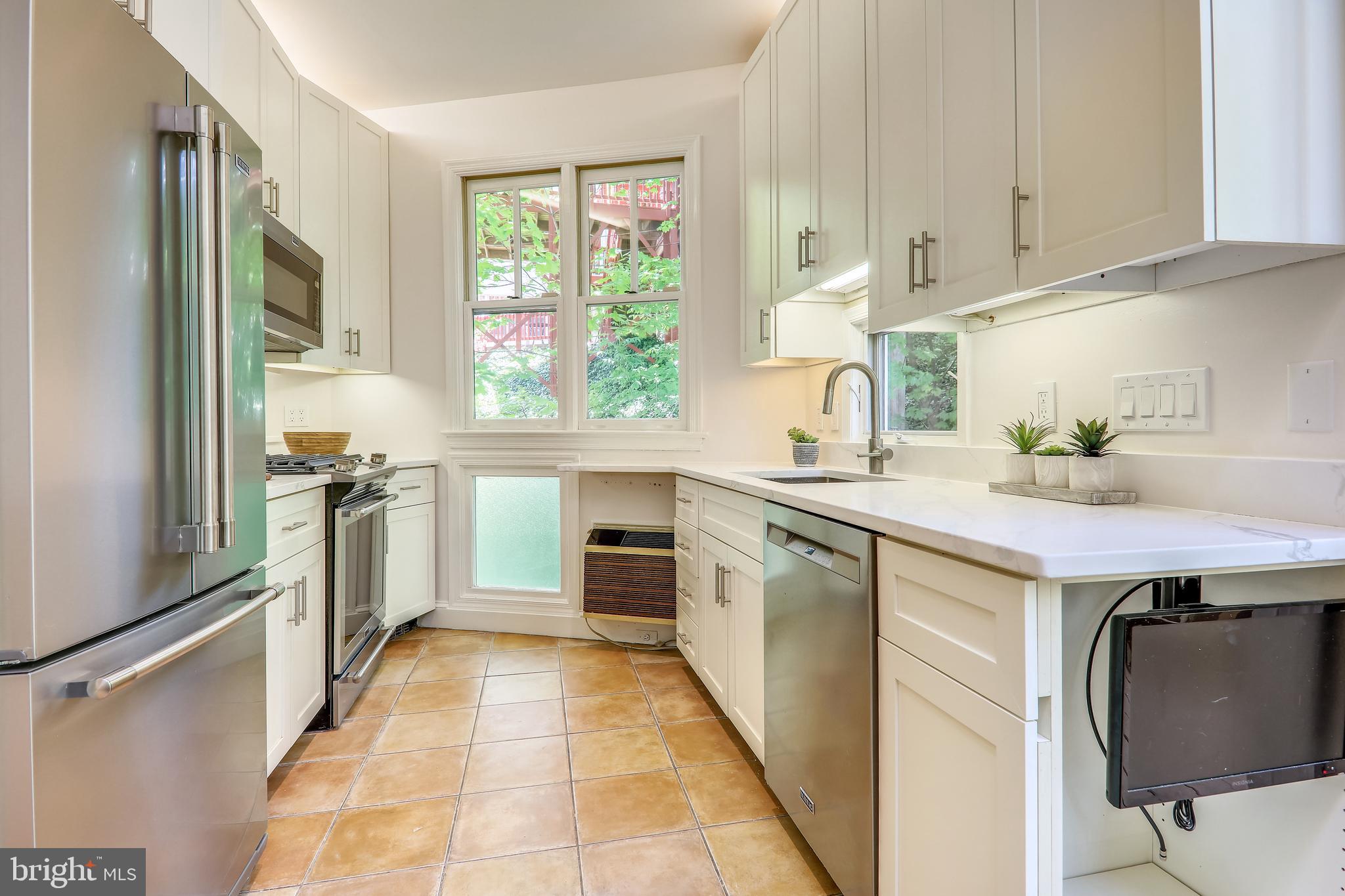 3512 30th Street Northwest Washington, DC 20008 - Photo 19 of 50 Renovated kitchen with quartz counter tops