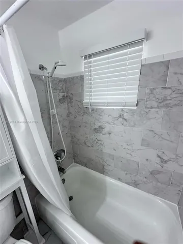 a bathroom with a bathtub