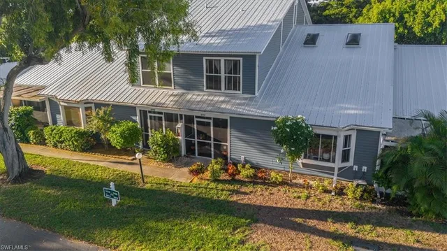 front view of a house with a yard