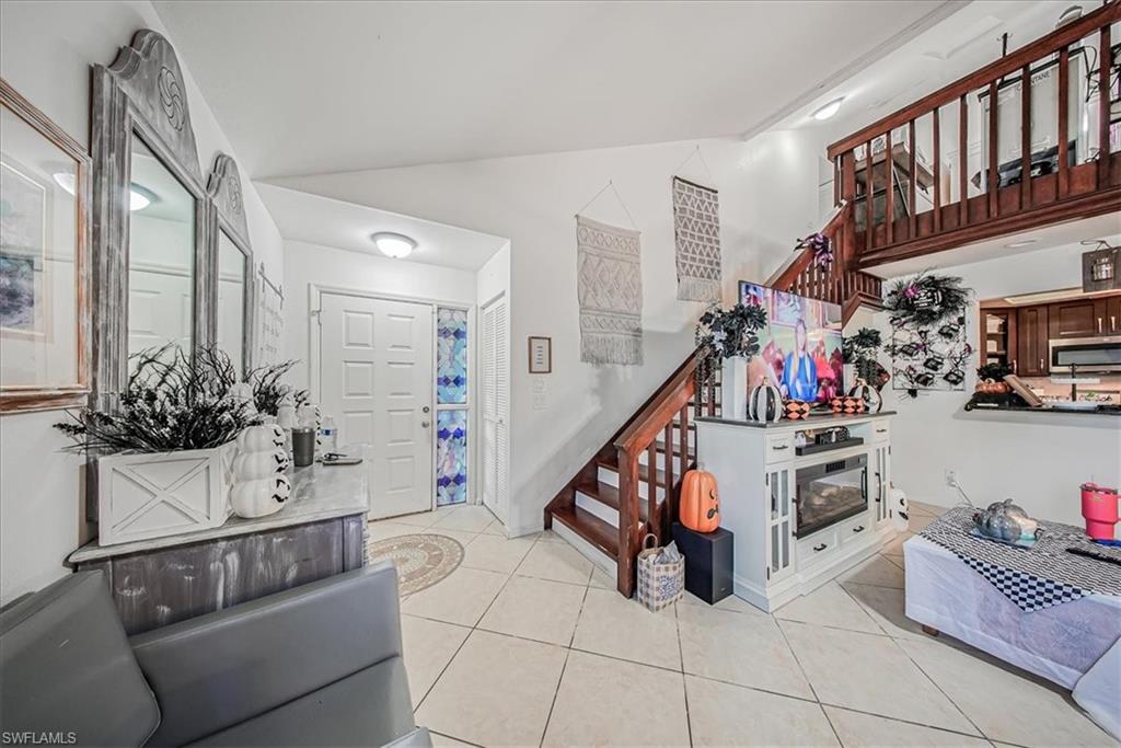 3408 Timberwood Circle, Unit 1360 Naples, FL 34105 - Photo 21 of 36 a storage room with furniture and lots of wooden furniture