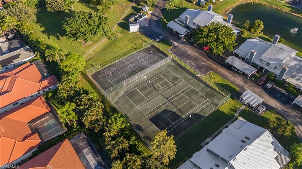 3408 Timberwood Circle, Unit 1360 Naples, FL 34105 - Photo 35 of 36 an aerial view of a house