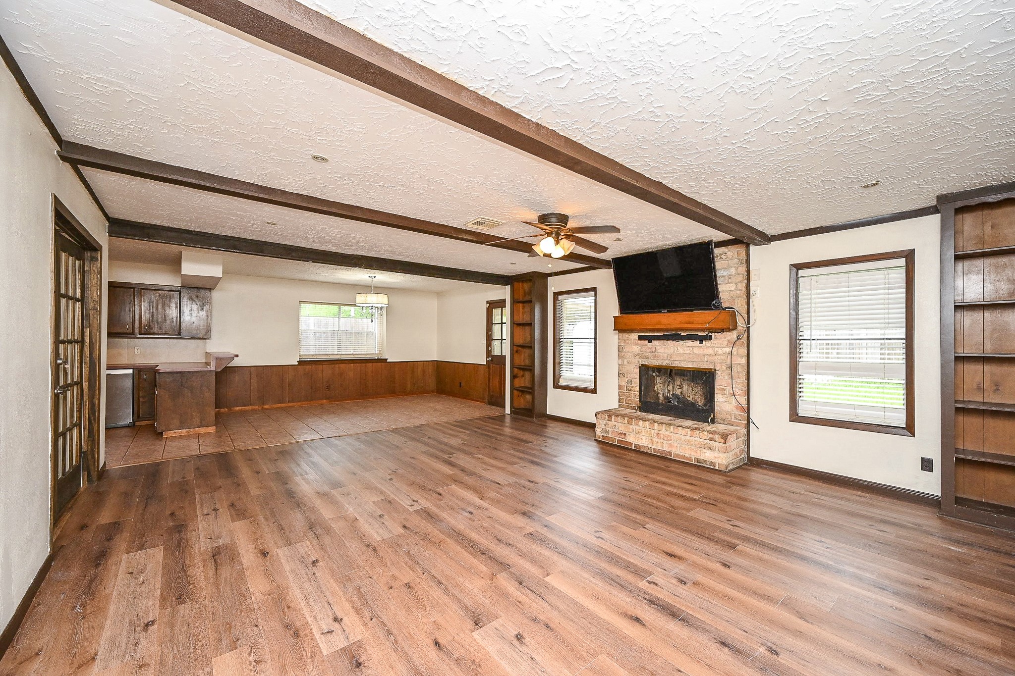 23814 Spring Gum Drive Spring, TX 77373 - Photo 7 of 21 a view of a livingroom with a furniture wooden floor and window
