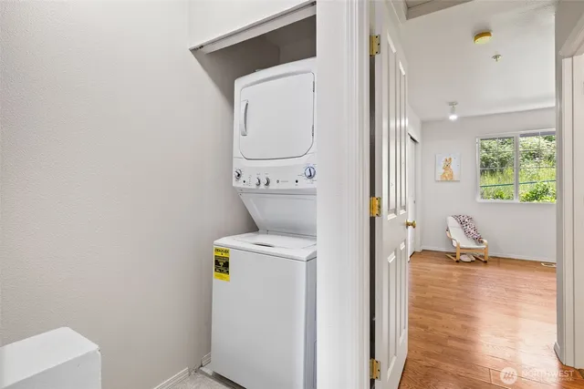 a view of hallway with washer and dryer