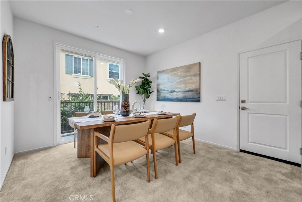 5584 Kate Way, Unit 10 Fontana, CA 92336 - Photo 4 of 42 a dining room with furniture and window