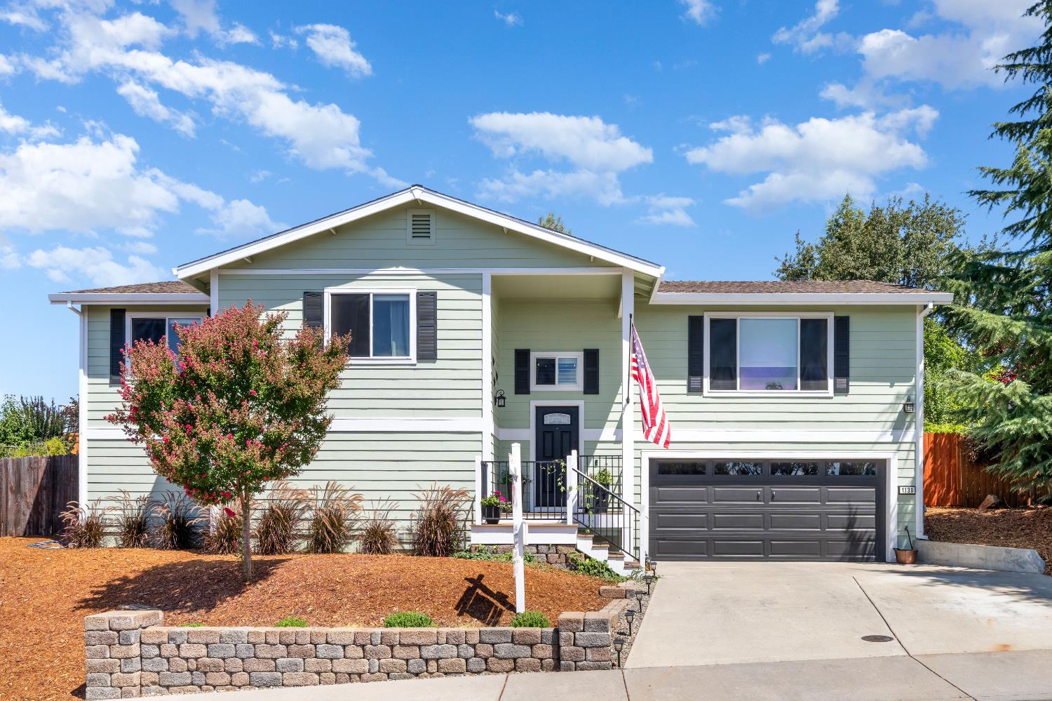 1130 Summer Ridge Court Auburn, CA 95603 - Photo 1 of 56 a front view of house with yard