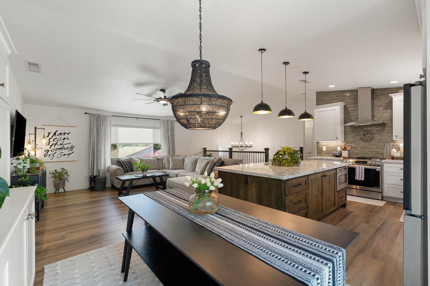 1130 Summer Ridge Court Auburn, CA 95603 - Photo 12 of 56 a living room with stainless steel appliances kitchen island granite countertop furniture and a view of kitchen