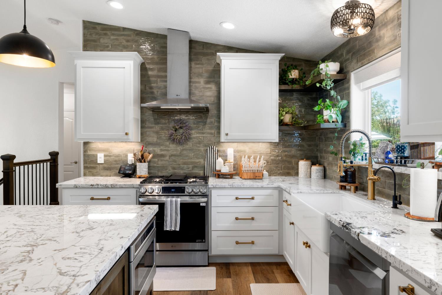 1130 Summer Ridge Court Auburn, CA 95603 - Photo 14 of 56 a kitchen with stainless steel appliances granite countertop a sink stove and refrigerator