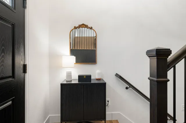 a view of a backyard with sitting area