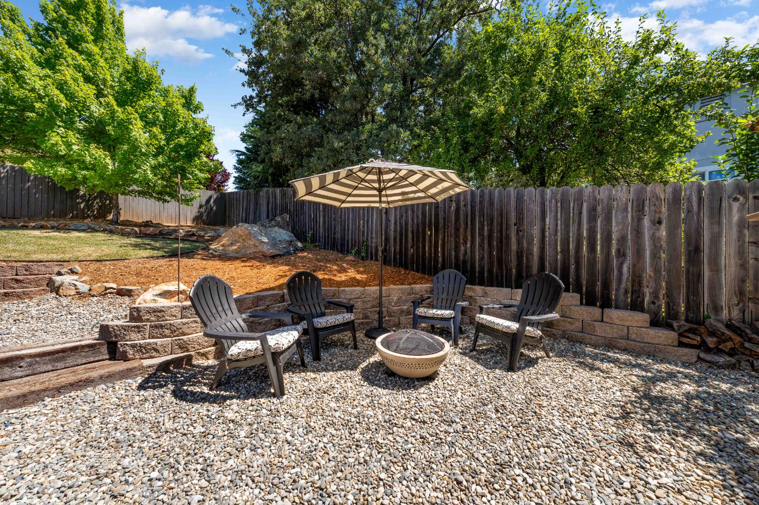 1130 Summer Ridge Court Auburn, CA 95603 - Photo 43 of 56 a view of a backyard with sitting area