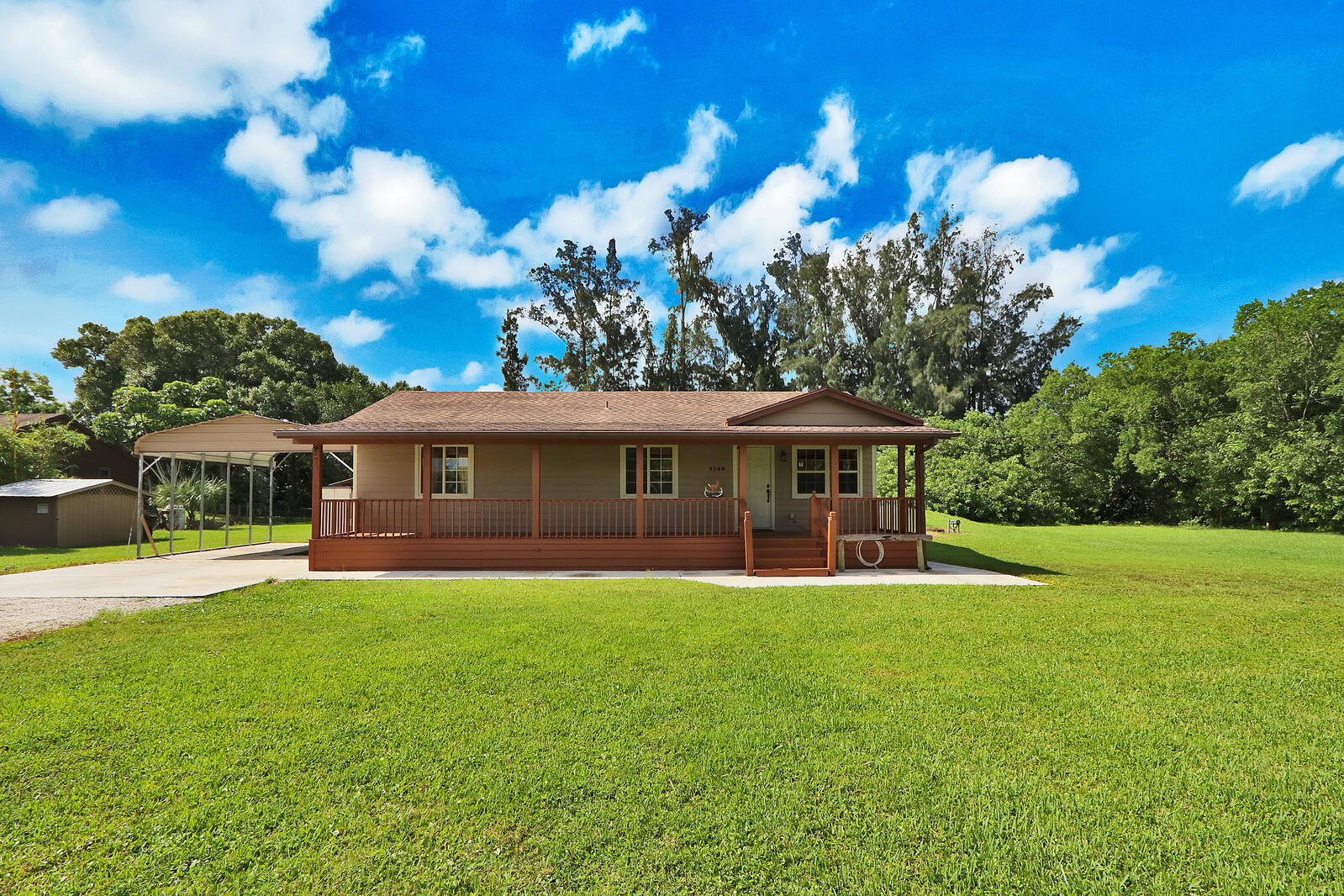 9142 Sandy Run Road Jupiter, FL 33478 - Photo 1 of 27 Fron View