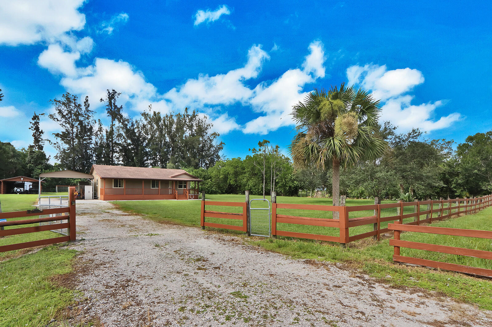 9142 Sandy Run Road Jupiter, FL 33478 - Photo 2 of 27 Driveway View