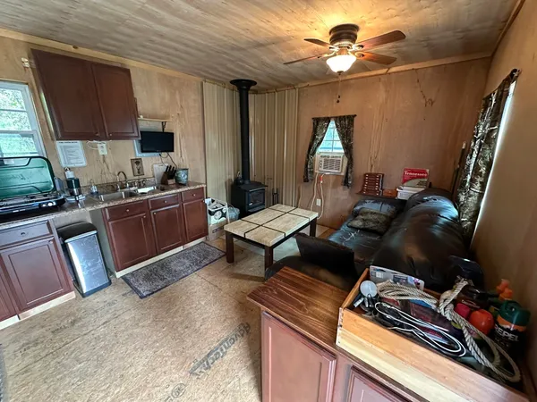 a bathroom with a sink a mirror and a bathtub