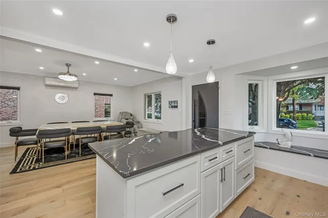 a utility room with sink dryer and washer