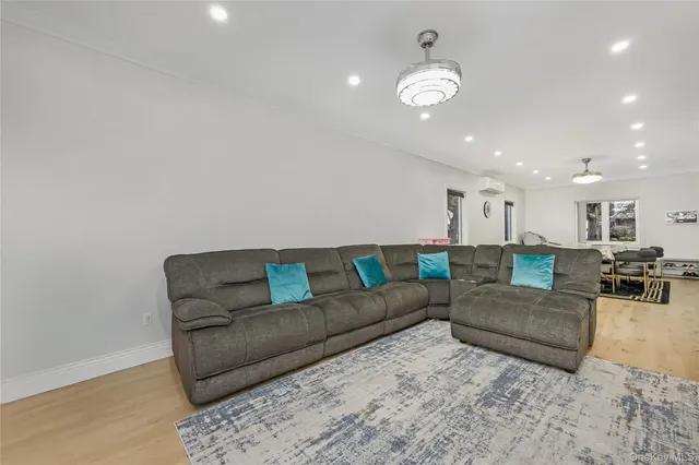 a kitchen with stainless steel appliances granite countertop a sink and a refrigerator