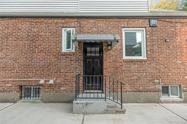 a front view of a house with a door