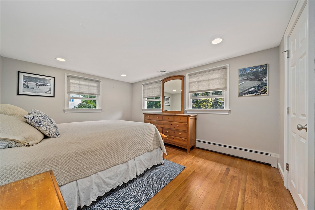 21 Old Coach Road Canton, MA 02021 - Photo 25 of 42 a bedroom with a large bed and a window