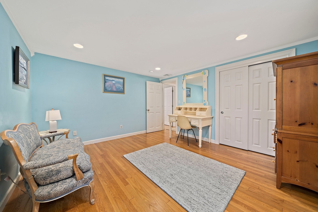 21 Old Coach Road Canton, MA 02021 - Photo 27 of 42 a living room with a couch and a coffee table