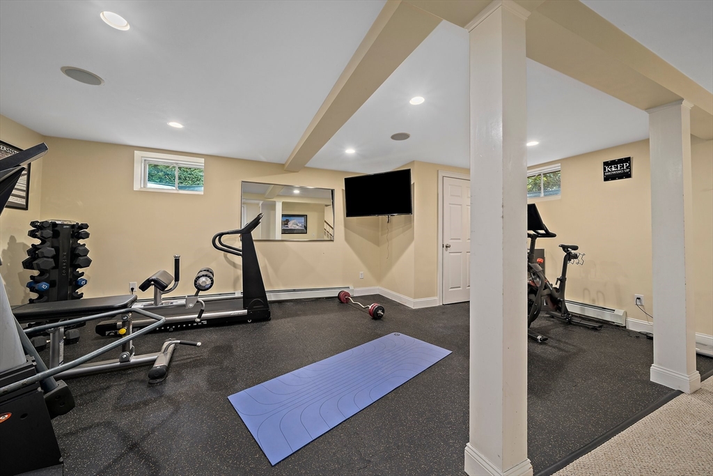 21 Old Coach Road Canton, MA 02021 - Photo 29 of 42 a view of a room with gym equipment