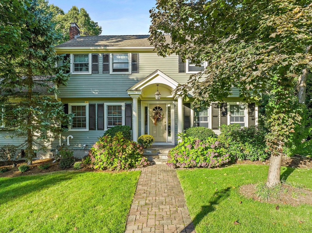 21 Old Coach Road Canton, MA 02021 - Photo 3 of 42 a front view of a house with garden