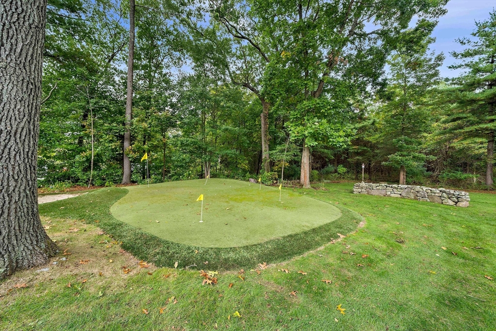 21 Old Coach Road Canton, MA 02021 - Photo 33 of 42 a view of a backyard with swimming pool