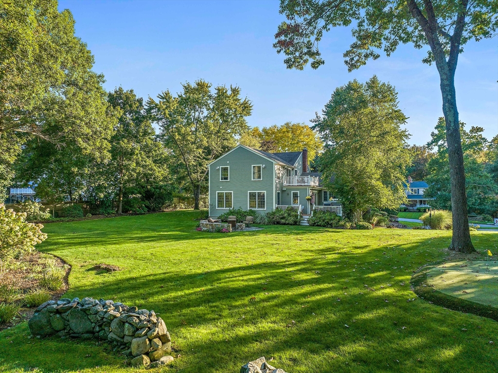 21 Old Coach Road Canton, MA 02021 - Photo 36 of 42 a front view of a house with a yard