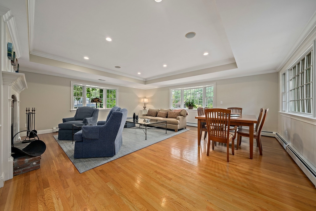 21 Old Coach Road Canton, MA 02021 - Photo 9 of 42 a living room with furniture a wooden floor and next to a window