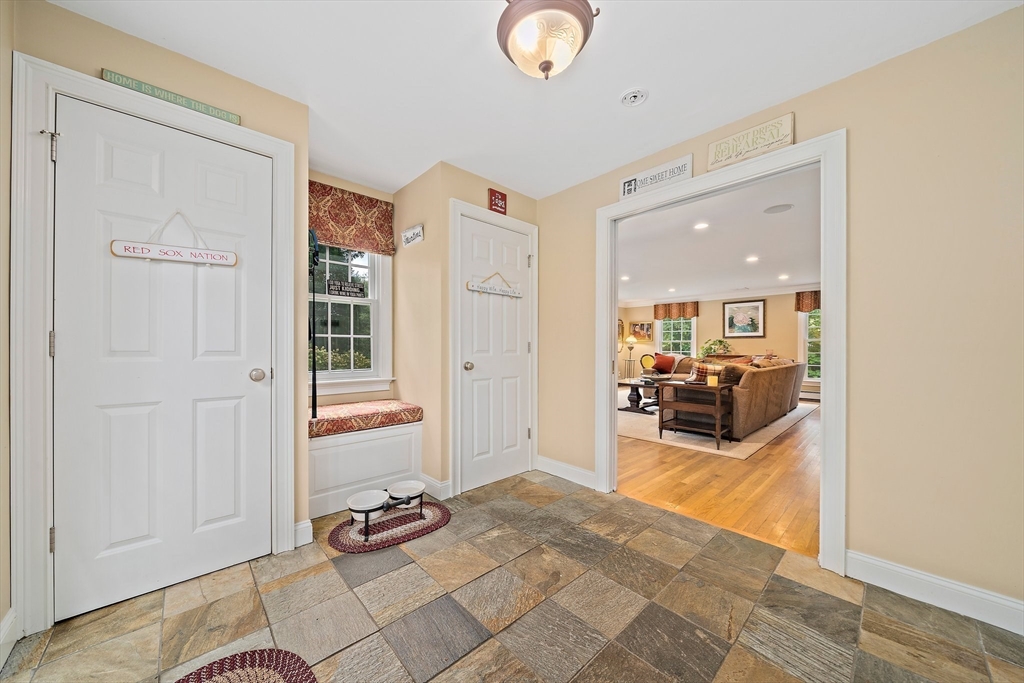 21 Old Coach Road Canton, MA 02021 - Photo 10 of 42 a view of a livingroom with furniture and floor to ceiling window
