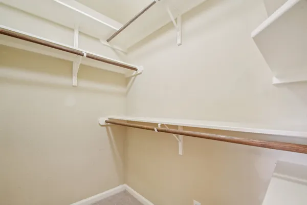 a view of a room with racks on the wall