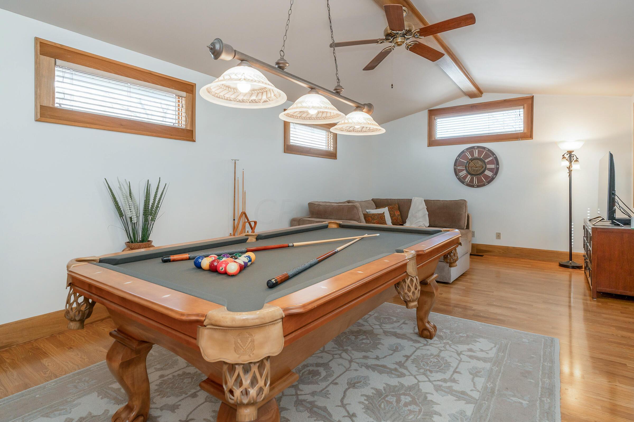 132 Chatham Road Columbus, OH 43214 - Photo 23 of 41 The pool table can convey with the home! Ideally positioned in the 1st floor family room, this space offers so many possibilities.