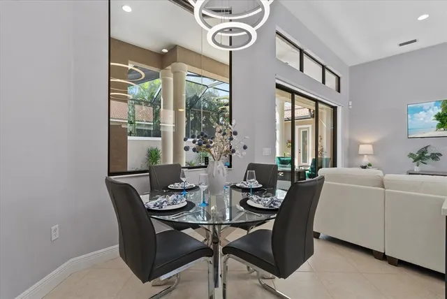 a kitchen with stainless steel appliances granite countertop a sink and stove