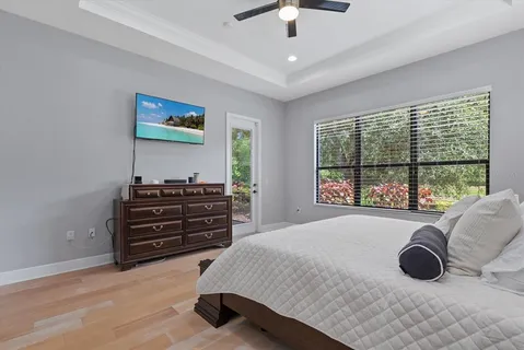 a lobby with furniture and floor to ceiling window